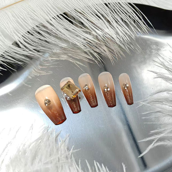 Artificial nails with elegant ombre effect and exquisite gemstones Kalsten