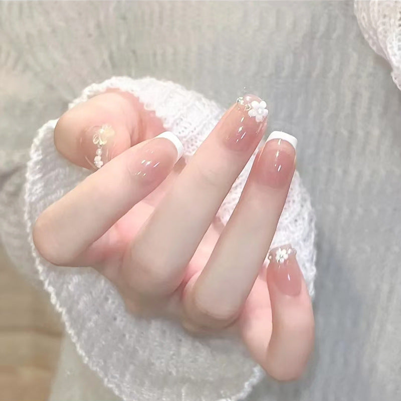 Nail set with elegant flower appliqués and exquisite glitter embellishments Kalsten