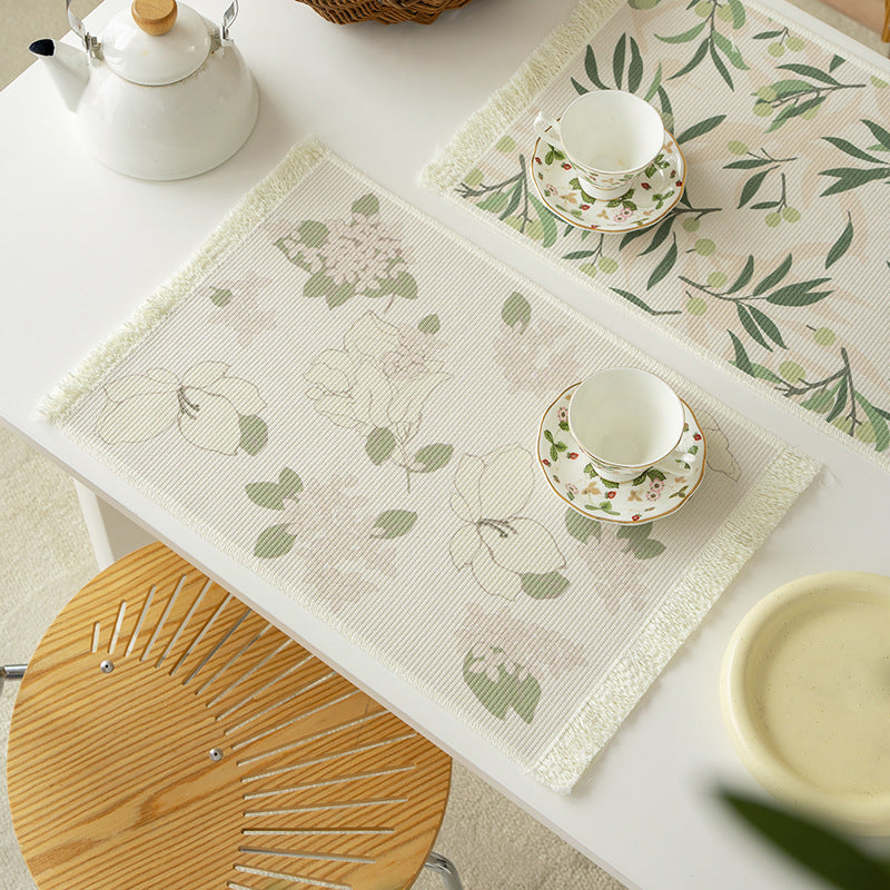 Floral woven bath mat with decorative fringes Kalsten