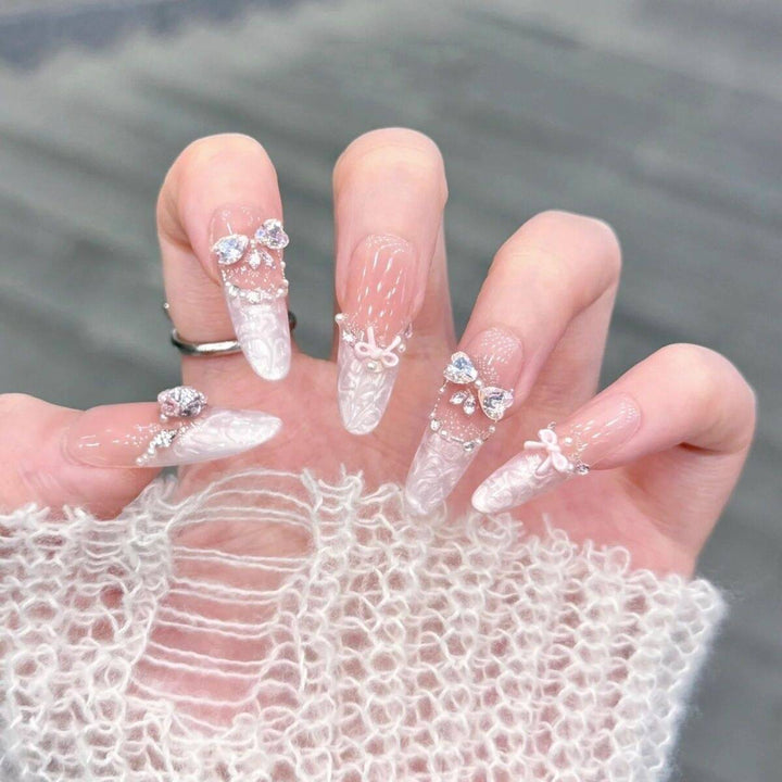 Artistic Stiletto Press-On Nail Art with Glimmering Accents Kalsten