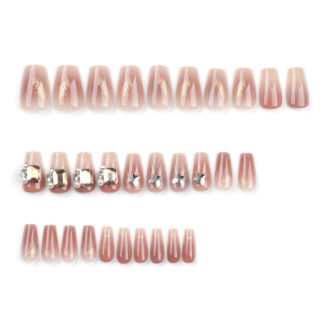 Artificial nail art with elegant jewelry accents Kalsten