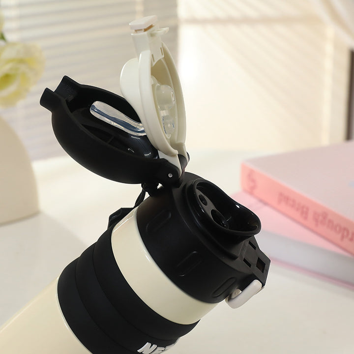 Insulated drinking bottle with a cute character design and practical carrying strap Kalsten