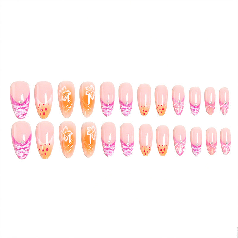 Acrylic nail set with exotic flower patterns and glitter accents Kalsten