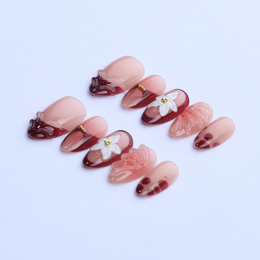 Artificial nail set with floral 3D applications and elegant gradient design Kalsten