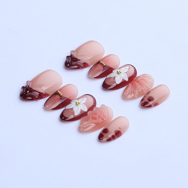 Artificial nail set with floral 3D applications and elegant gradient design Kalsten