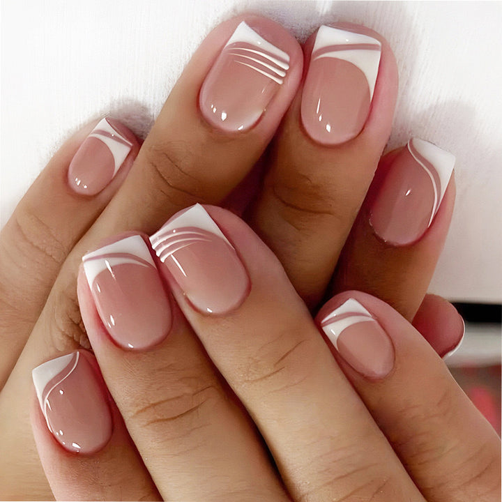 Artificial nail set with elegant French nail design and modern lines Kalsten