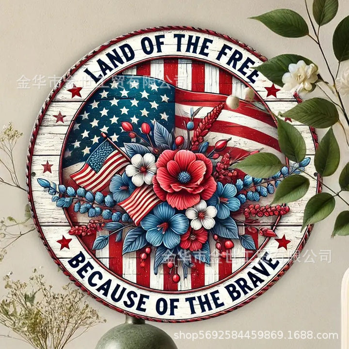 Independence Day rustic round wooden patriotic cross wall plaque with floral accents and God Bless America banner Kalsten