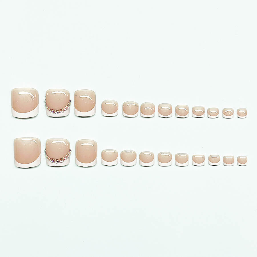 Nail art set with elegant French lace decoration and glitter accents Kalsten
