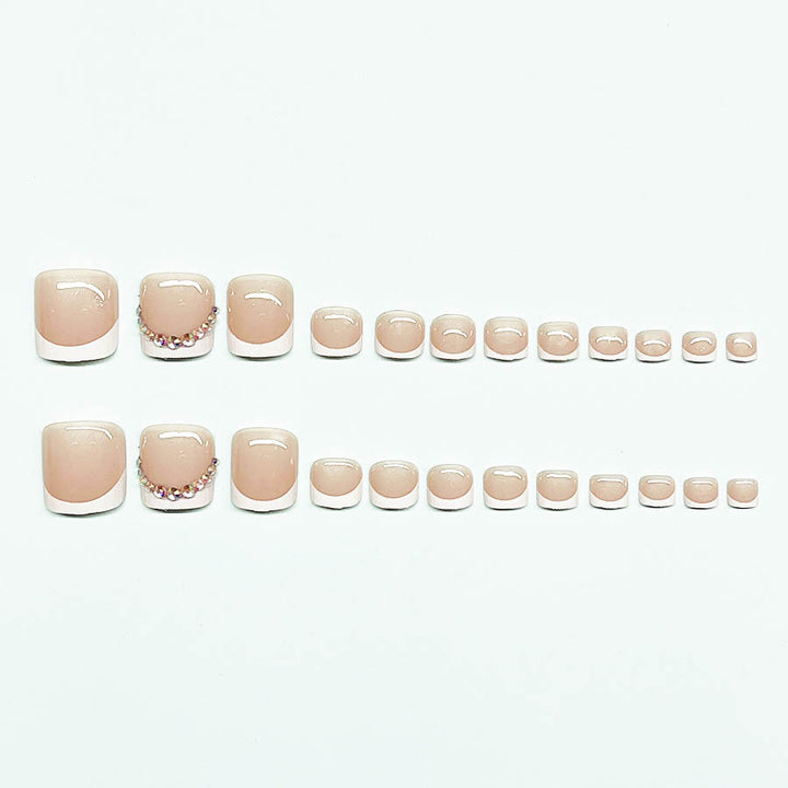 Nail art set with elegant French lace decoration and glitter accents Kalsten
