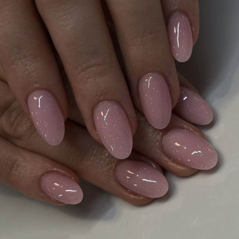 Artificial nail extensions with glitter accents Kalsten