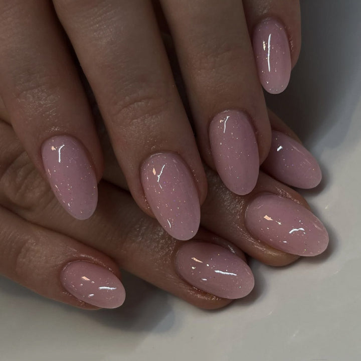 Artificial nail extensions with glitter accents Kalsten