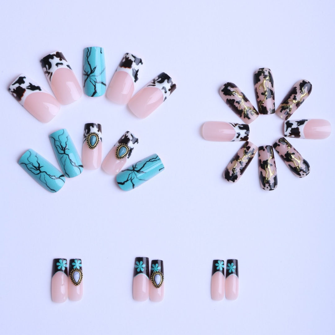 Artful fingernails with unique marble and jewelry design Kalsten