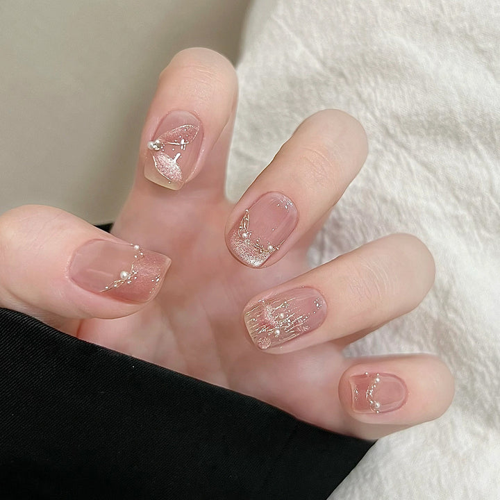 Handmade art nails with delicate embellishments Kalsten