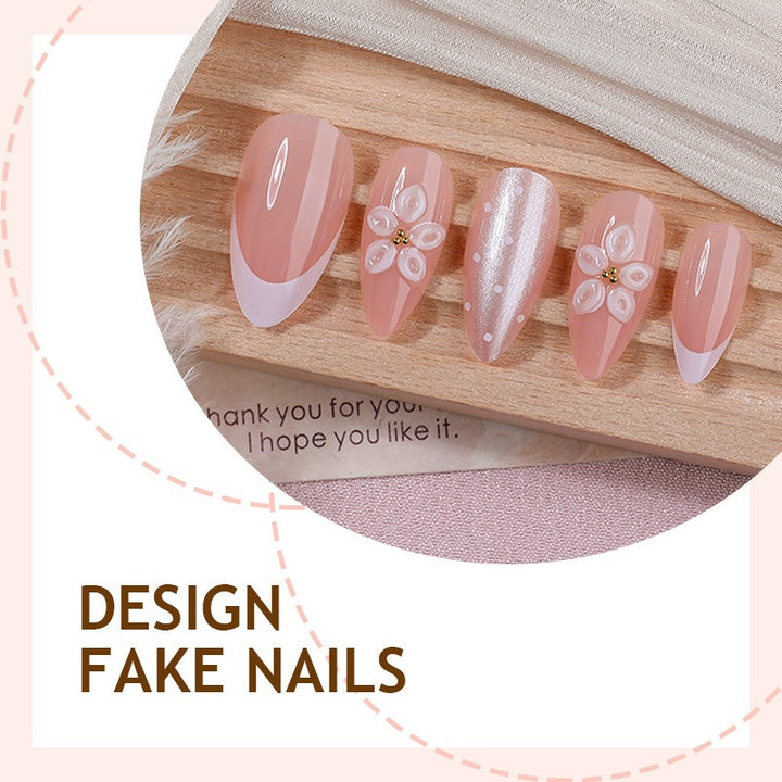 Artificial nail set with elegant French tips and delicate floral accents Kalsten