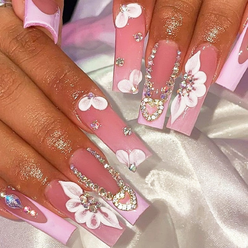 Glamorous artificial nail set with sparkling rhinestones and cross decorations Kalsten