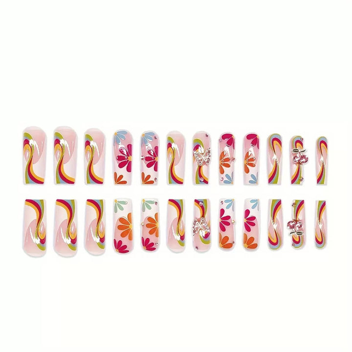Nail art set with glowing flower motifs and glitter accents Kalsten