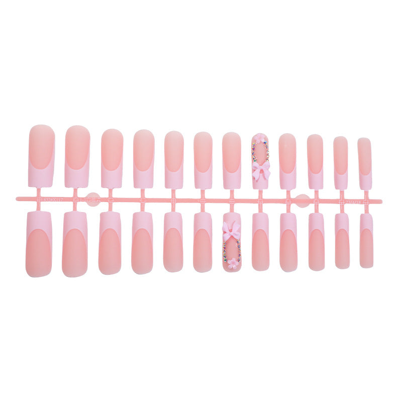 Decorative Press-On Nail Art with Floral and Bow Accents kalsten