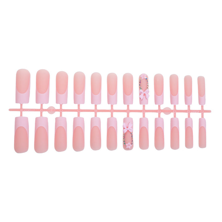 Decorative Press-On Nail Art with Floral and Bow Accents kalsten