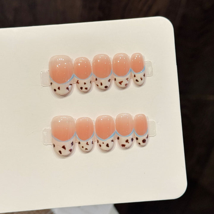 Artistic Press-On Nail Art Set with Whimsical Design