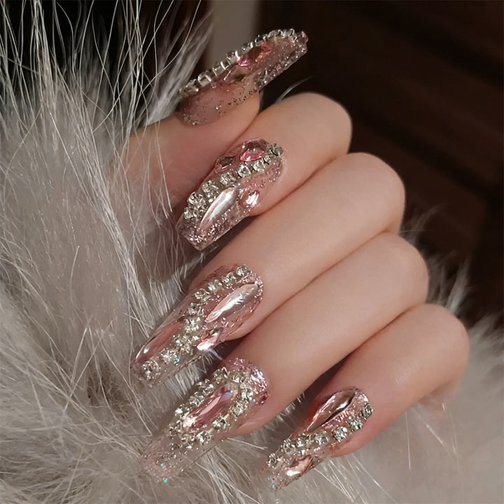 Glamorous artificial nails with sparkling rhinestone decorations Kalsten