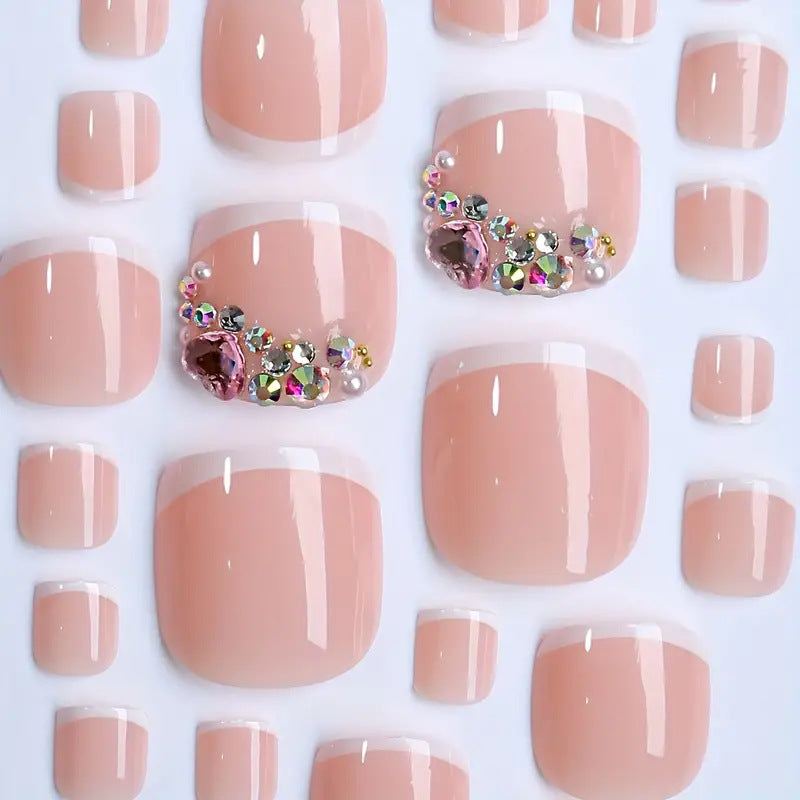 Artificial nail set with elegant French tips and glamorous crystal embellishments Kalsten