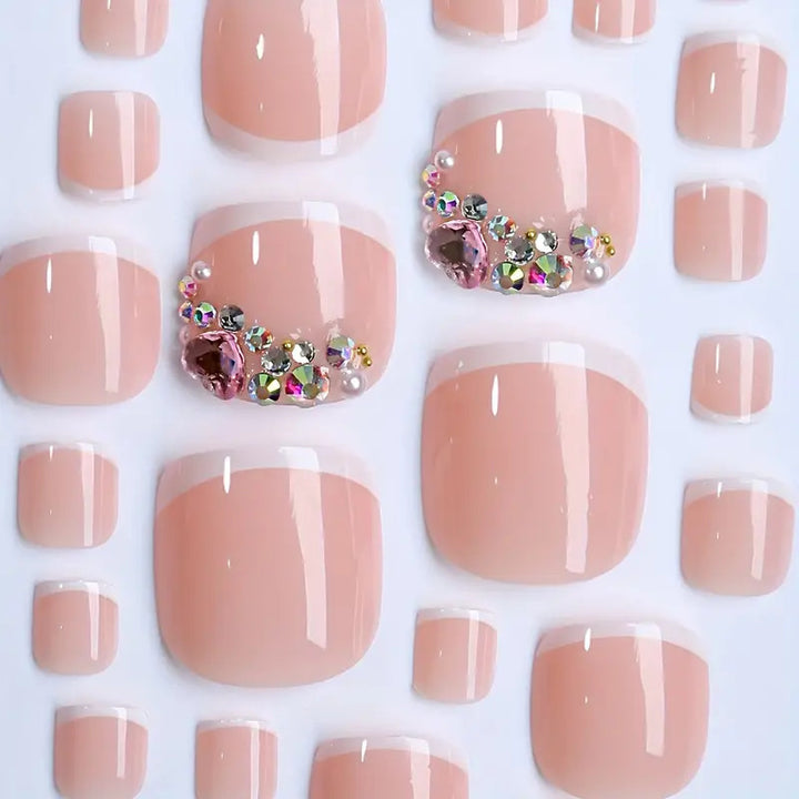 Artificial nail set with elegant French tips and glamorous crystal embellishments Kalsten