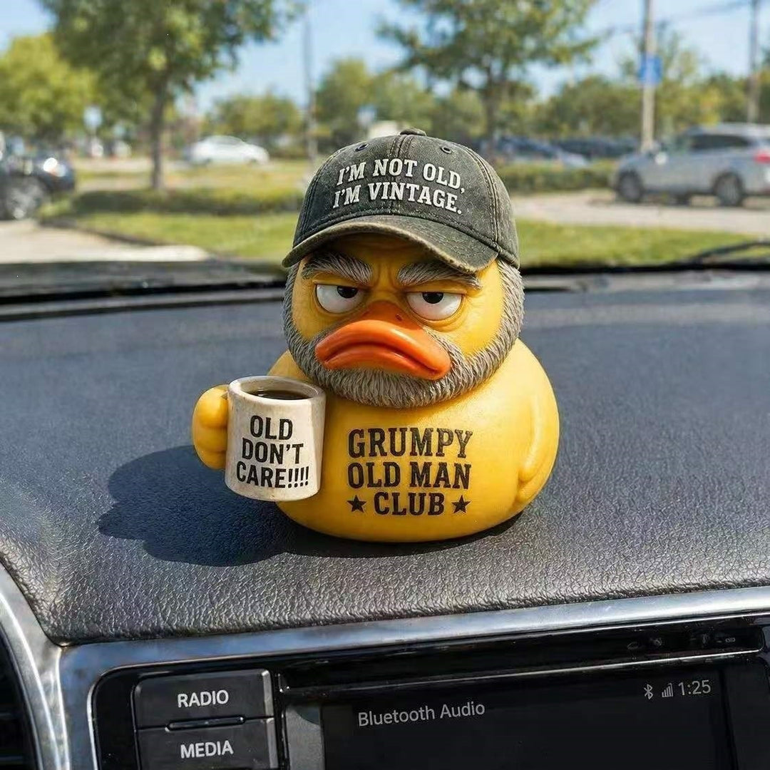 Funny rubber duck with vintage hat and cup Kalsten