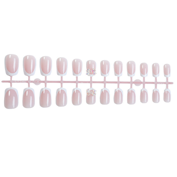 Elegant artificial nails with delicate glitter and decorative accents Kalsten