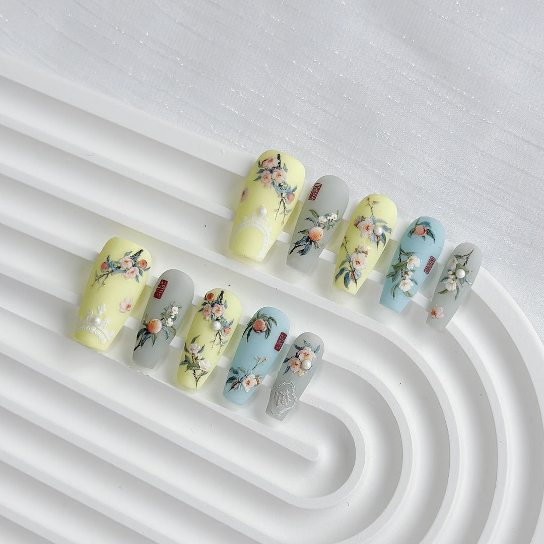 Artistic Press-On Nail Art Set with Heart and Celestial Designs