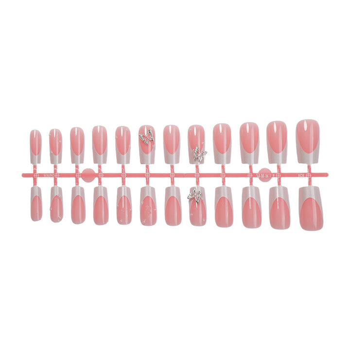 Nail art set with intricate designs and butterfly appliqués Kalsten