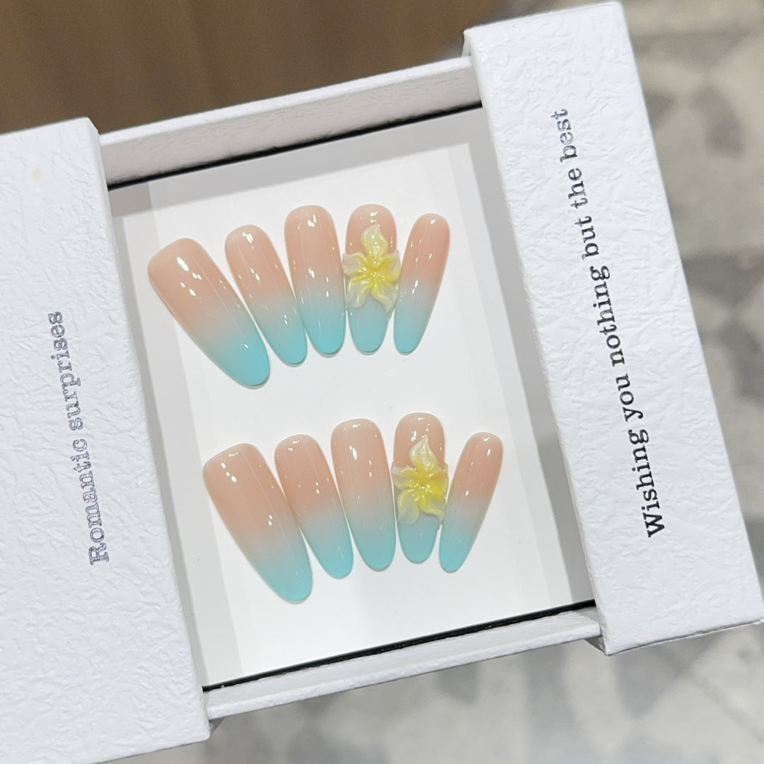 Artificial nails with enchanting ombre effect and floral accents Kalsten