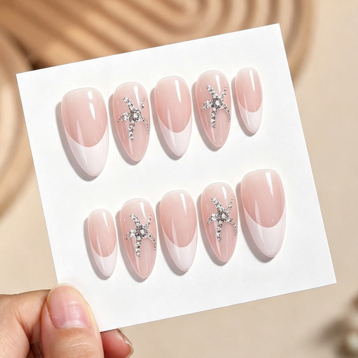 Artificial nail set with elegant French design and sparkling accents Kalsten