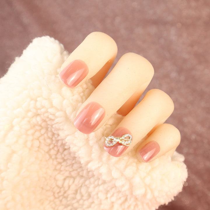 Elegant Press-On Nail Set with Rhinestone Bow