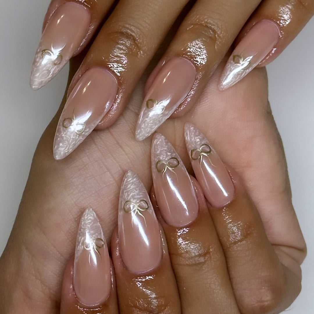 Artful stiletto nails with elegant design and radiant accents Kalsten