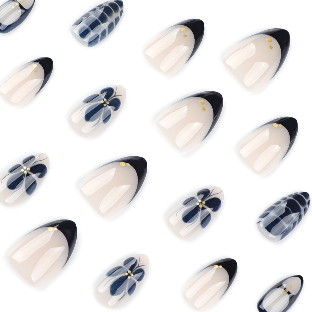 Artful nail art in elegant stiletto design with floral accents Kalsten