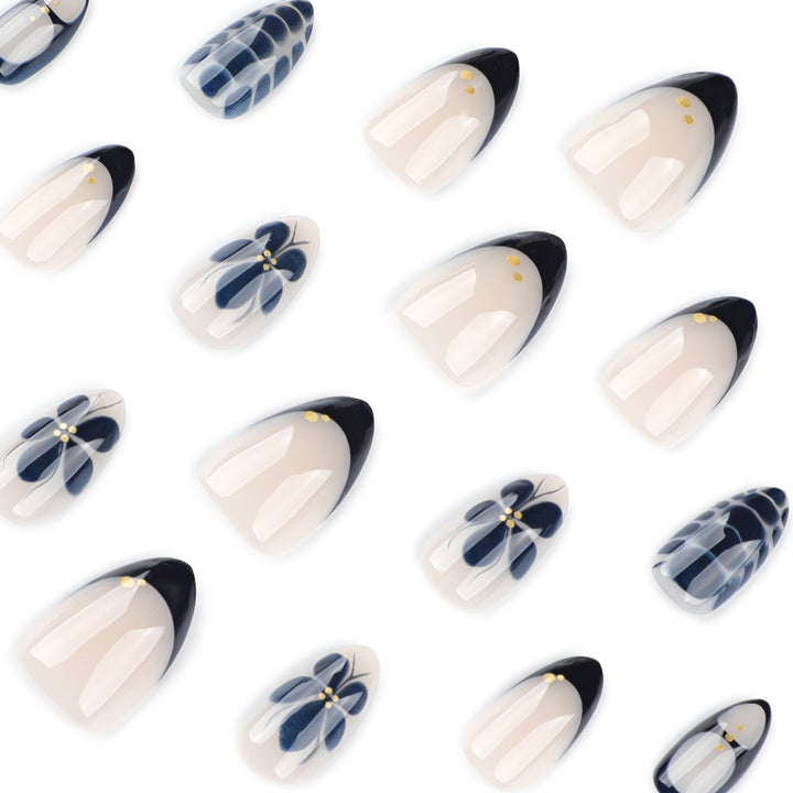 Artful nail art in elegant stiletto design with floral accents Kalsten