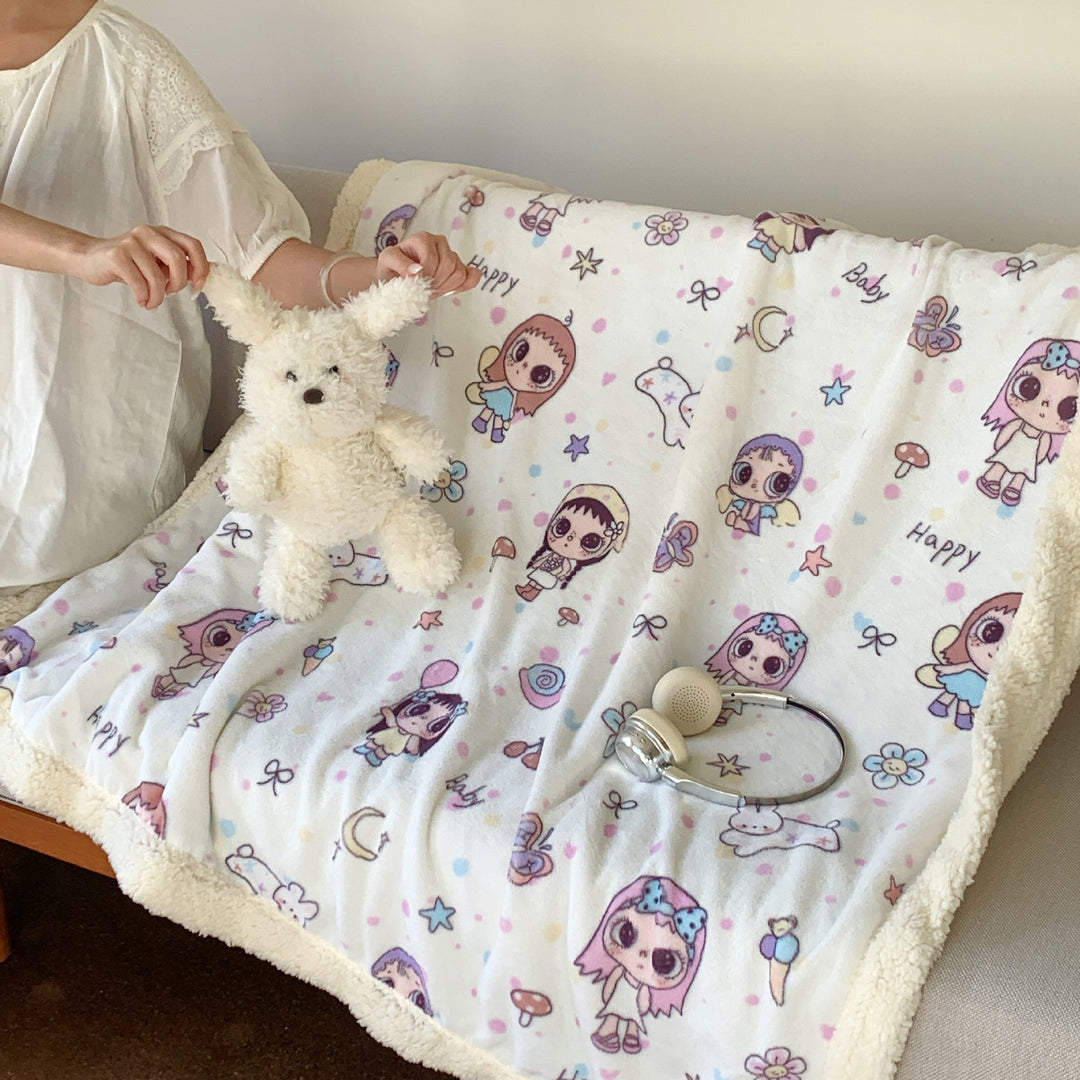 Reversible fleece blanket with cartoon cat design and teddy lining