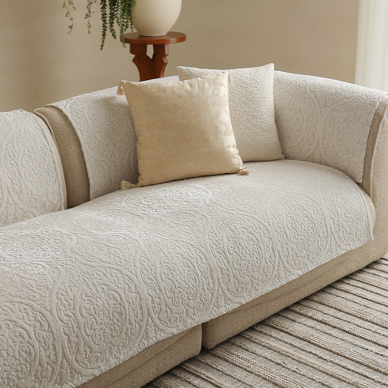 three-seater sofa with removable jacquard protective covers and curved armrests