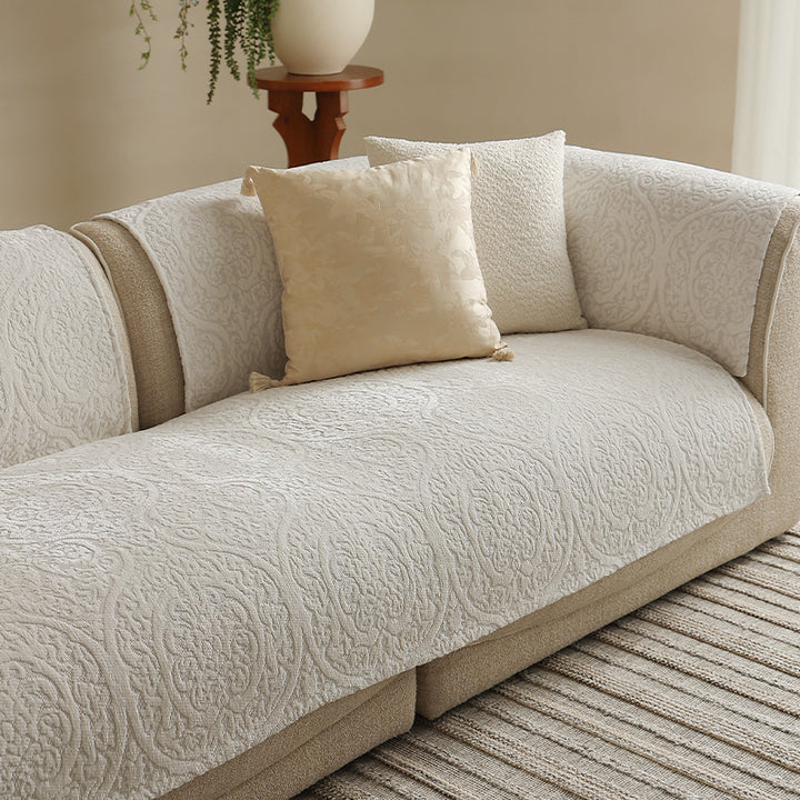three-seater sofa with removable jacquard protective covers and curved armrests