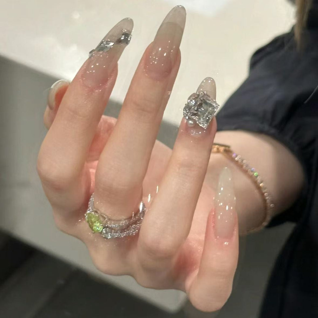Elegant Stiletto Nail Extensions with Rhinestone Accents Kalsten