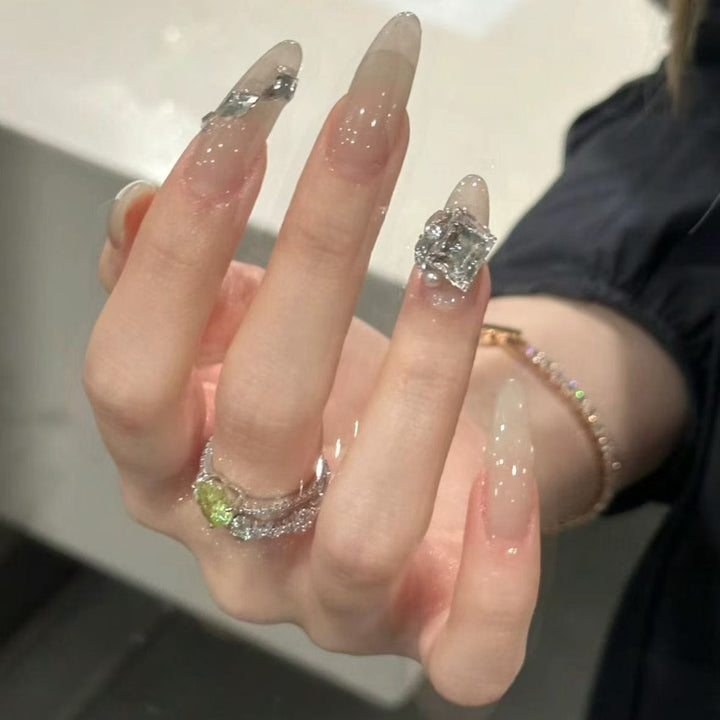 Elegant Stiletto Nail Extensions with Rhinestone Accents Kalsten