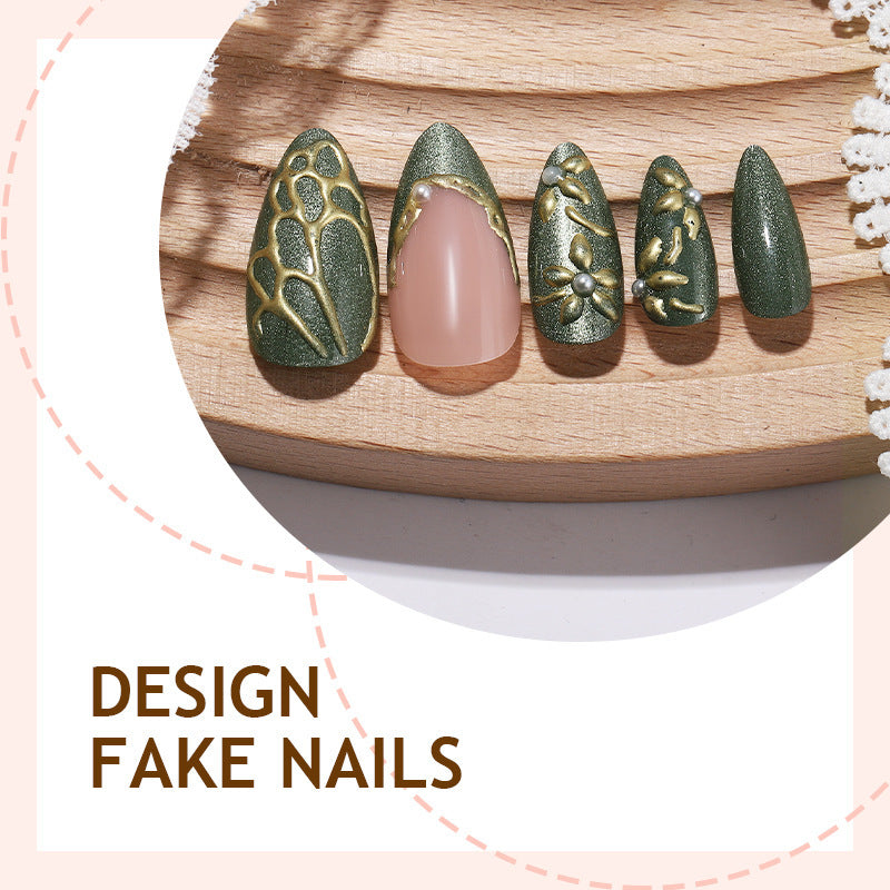 Elegant artificial nail set with intricate design and gold embellishments Kalsten