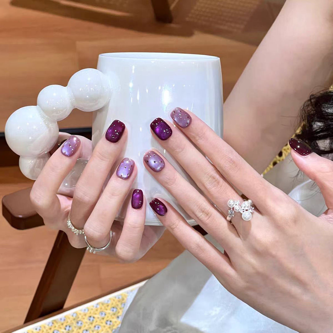 Artificial nails with luxurious ombre effect and sparkling accents Kalsten