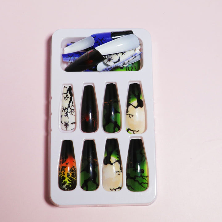 Artistic Press-On Nail Design with Dripping Effect Kalsten
