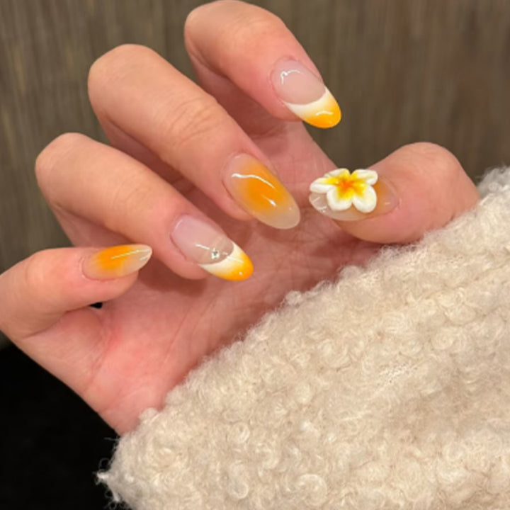 Artful nail extensions with delicate ombre effect and floral accents Kalsten