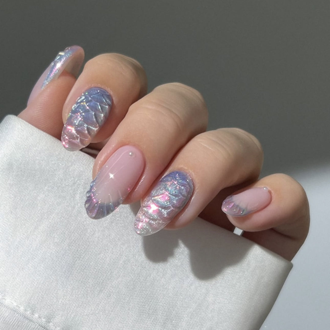 Artful nail extensions with shimmering play of colors and glamorous accents Kalsten