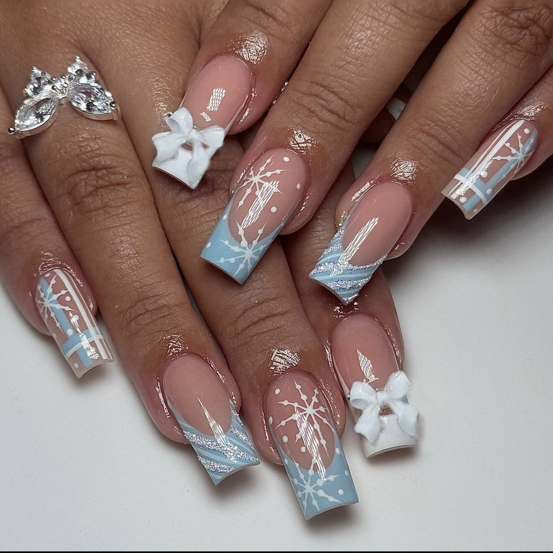 Artificial nail set with winter snowflake and bow motifs Kalsten