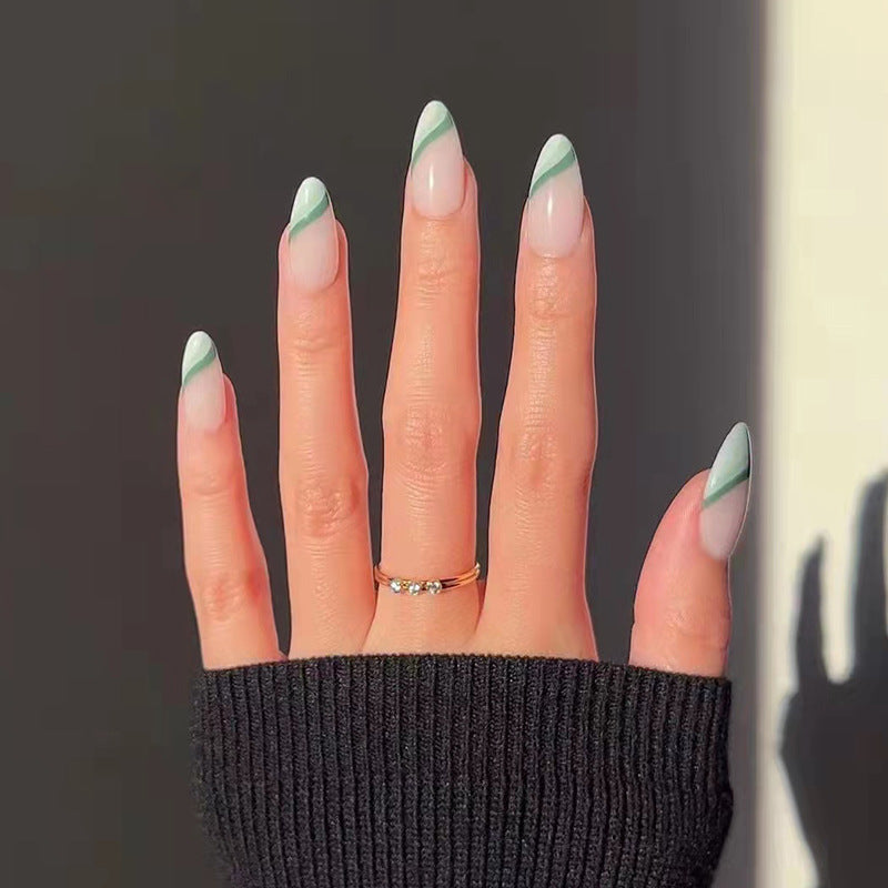 Artful nail extensions with an elegant leaf pattern Kalsten