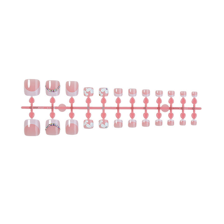 Creative nail art set with elegant flower designs and glitter accents Kalsten
