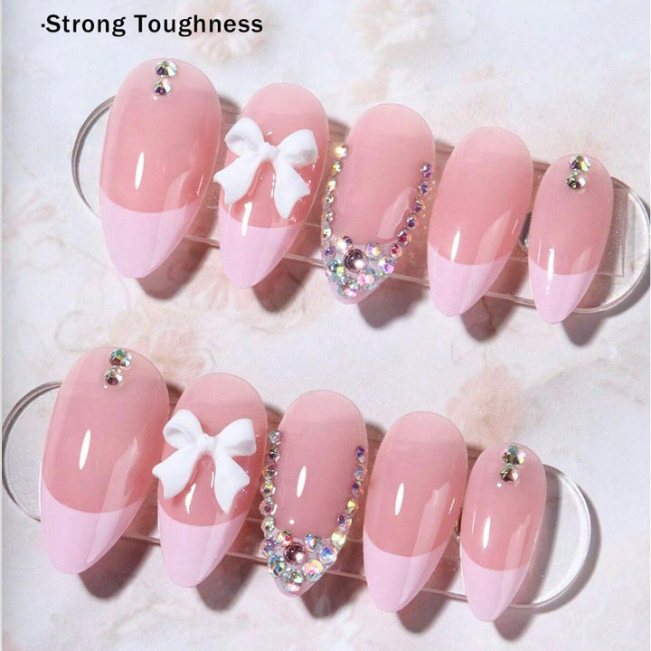 Acrylic nail set with elegant 3D bows and sparkling rhinestone embellishments Kalsten